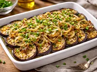 Berenjenas fritas con cebolla