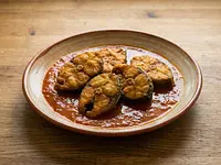 Pescado frito en salsa de Puebla