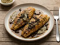 Filetes de pescado en salsa aromática