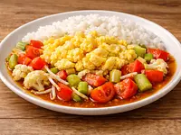 Huevos y legumbres en salsa agridulce